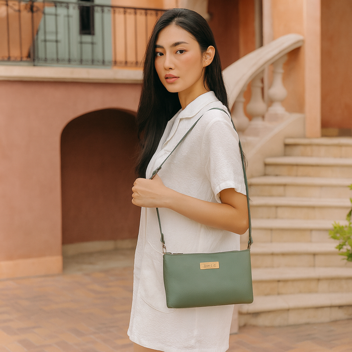 Women's olive green leather crossbody sling bag for work, travel, and daily use-model image