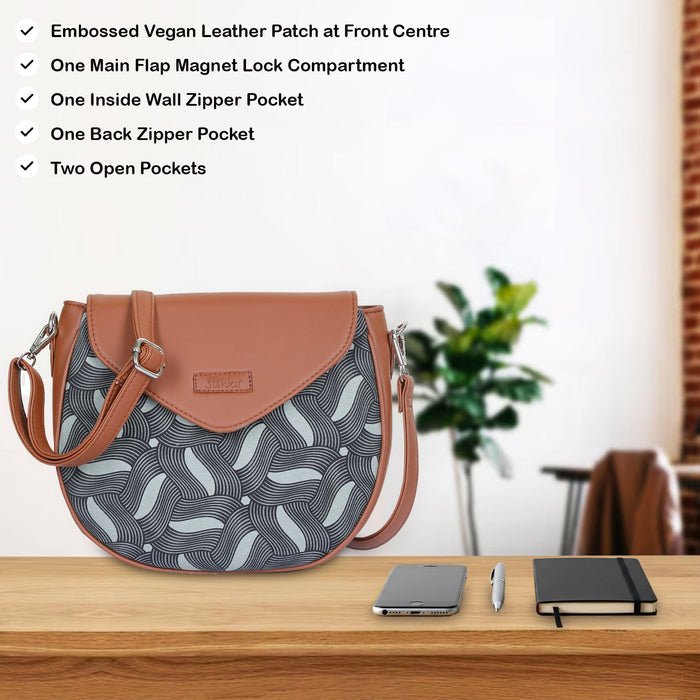 Olive green printed canvas shoulder‑sling bag with tall soft silhouette for travel and everyday use-feature view