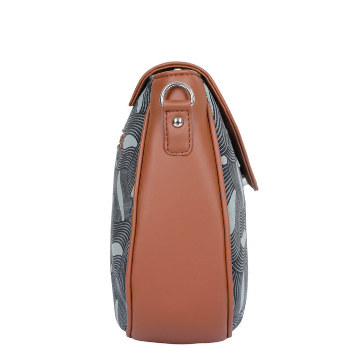 Olive green printed canvas shoulder‑sling bag with tall soft silhouette for travel and everyday use-side view