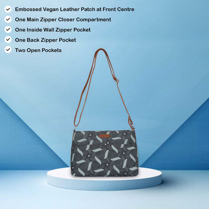 Olive green printed canvas shoulder‑sling bag with soft relaxed silhouette for travel and everyday use-feature image