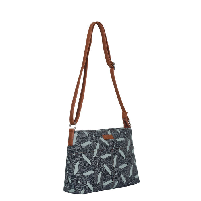 Olive green printed canvas shoulder‑sling bag with soft relaxed silhouette for travel and everyday use-half side view