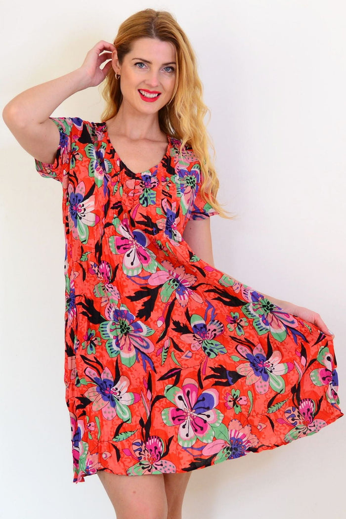 Orange Nicola dress tunic with cap sleeves by One Summer, stylish and comfortable for casual wear.