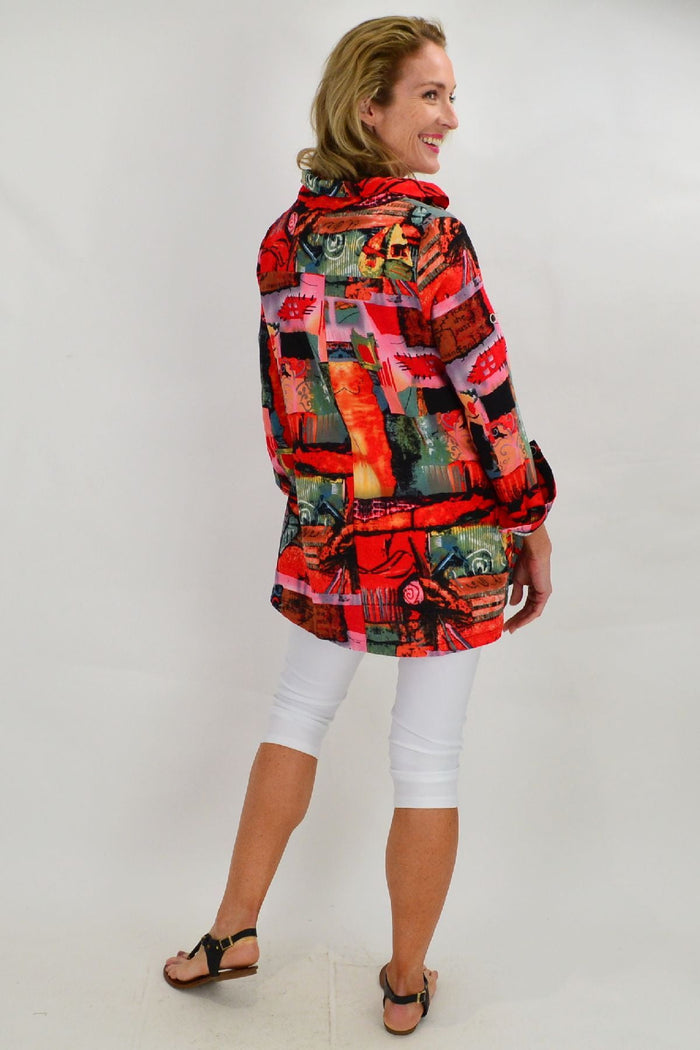 Colorful orange train-themed high collar tunic shirt by Ruby Rain, featuring vibrant design and comfortable fit.