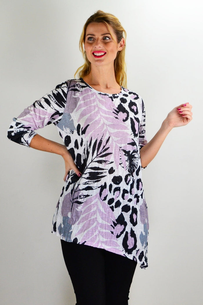 Pink jungle print crinkle tunic top from Cafe Latte, showing flowy fabric and vibrant tropical pattern on a lightweight tunic.