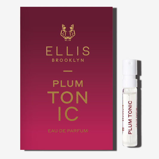 PLUM TONIC 1.5ml Eau De Parfum Vial next to red ombre PLUM TONIC Eau De Parfum vial holder card on white background.