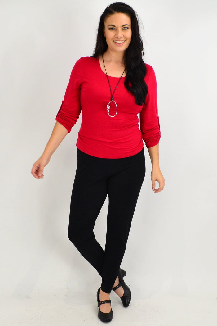 Plus size black leggings by Room to Move, made in Australia, shown on a model with a comfortable, stretchy fit.