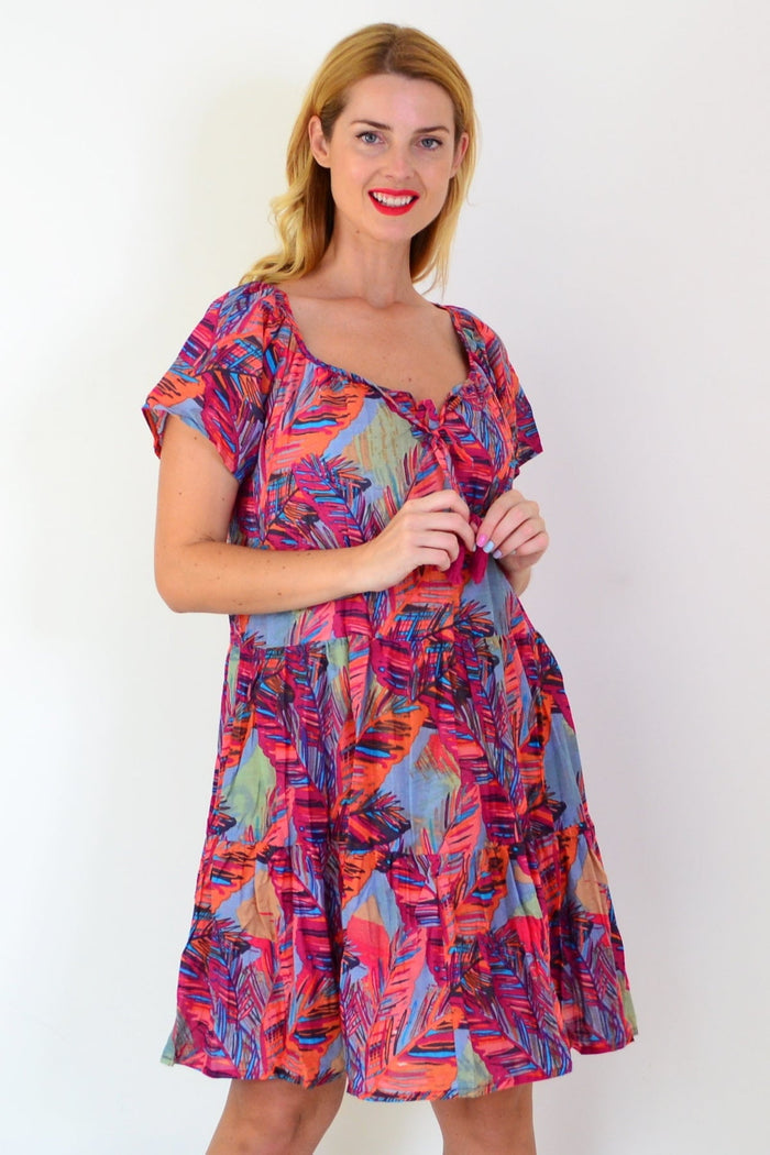 Poppy Palm Leaves cap sleeve tunic dress by One Summer, featuring a vibrant floral pattern and relaxed fit.