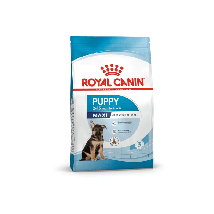White background with a blue bag of Royal Canin Maxi Puppy. Pictured on the bag is a German Shepherd puppy , text on the bag states '2 - 15 months' and 'Maxi, Adult Weight upto 26-44kg'.