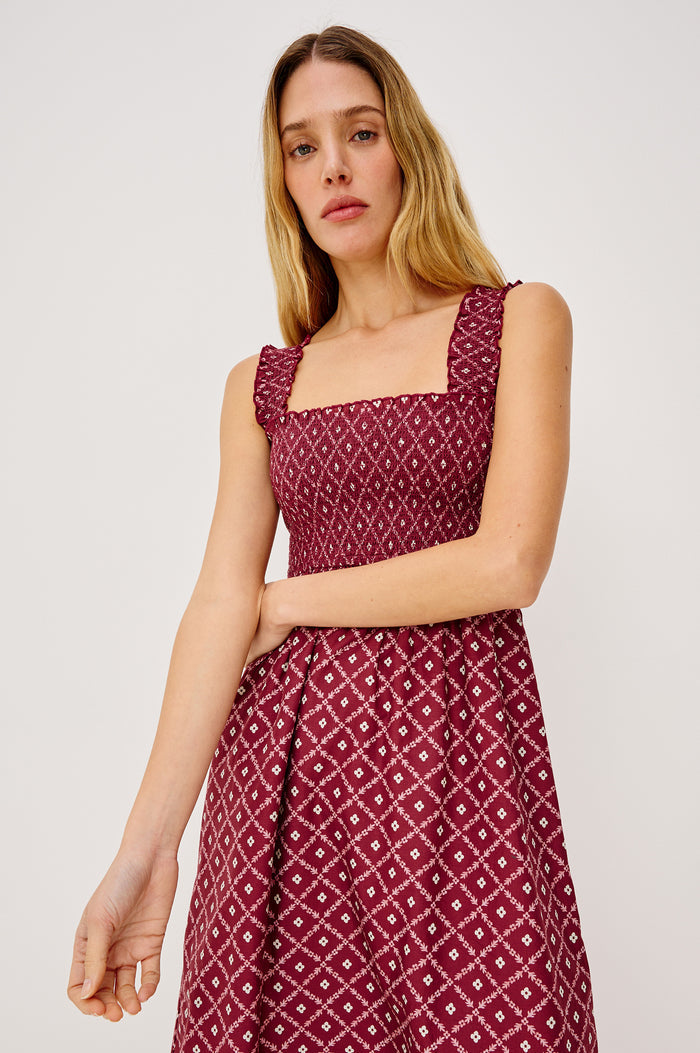 Rumi Midi Dress in Cotton Voile With Smocked Shoulder Straps and Bust, Empire Waist, and Ruffle Hem in Flower Chain Colorway - Upper Body Front View Featured on Model