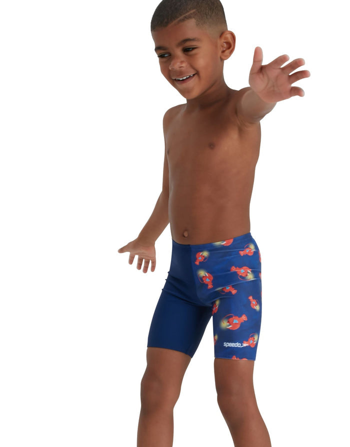 Speedo Tots Boys Digi Allover Jammer: Navy blue swim trunks with red yellow flamingo print, quick-dry fabric