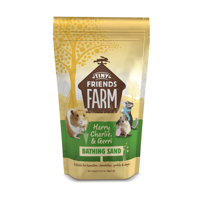 White background with a bag of Tiny Friends Farm Bathing Sand for small animals. Pictured on the bag is a Hamster, a chinchilla and a gerbil.