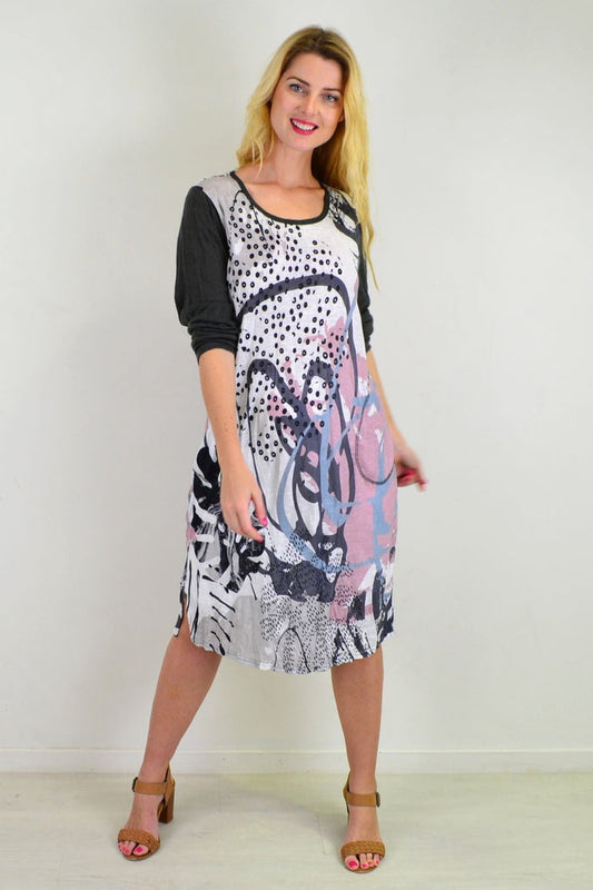 Sweet Caroline Crinkle Tunic Dress by Cafe Latte, shown in soft fabric with a relaxed fit and stylish crinkle texture.