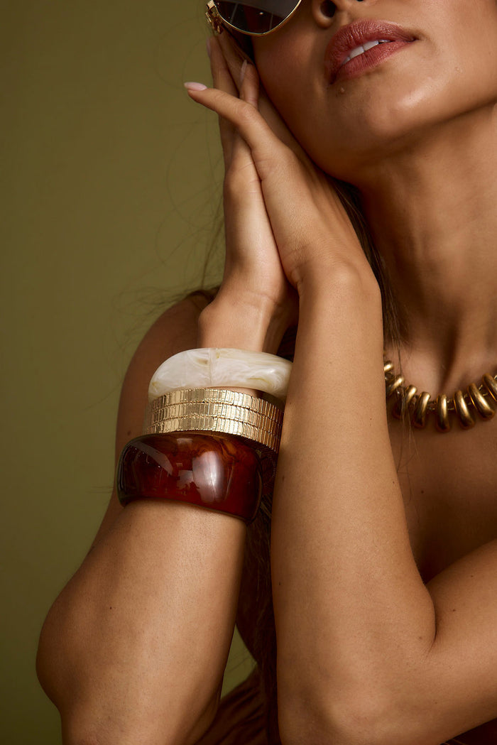 Close-up of the Tabby Set of 2 Chunky Bangles showcasing the fabric texture and design details.