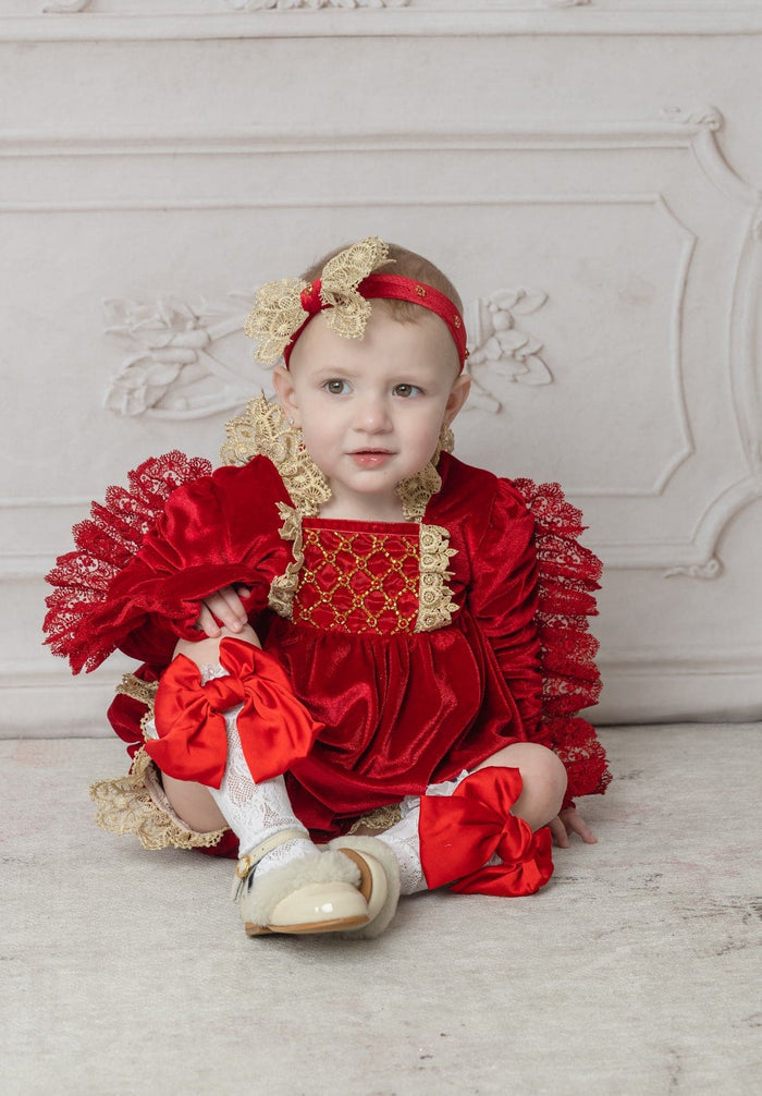 Close up of the Victoria red velvet hair sash highlighting the lace bow, velvet band, and vintage inspired design
