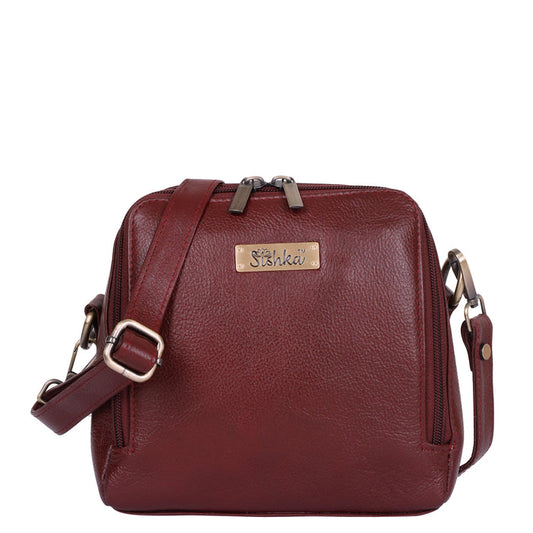 Women's cherry red leather crossbody sling bag for work, travel, and daily use
