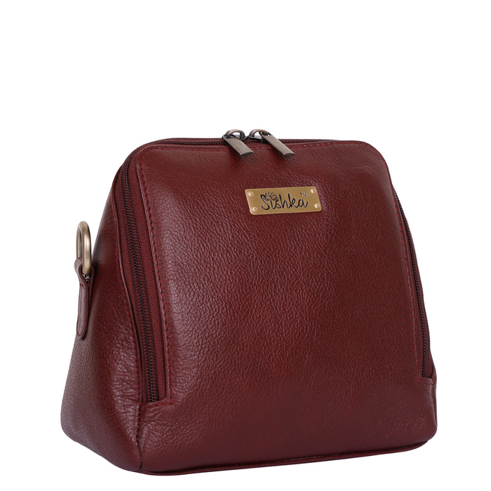 Women's cherry red leather crossbody sling bag for work, travel, and daily use-half side view