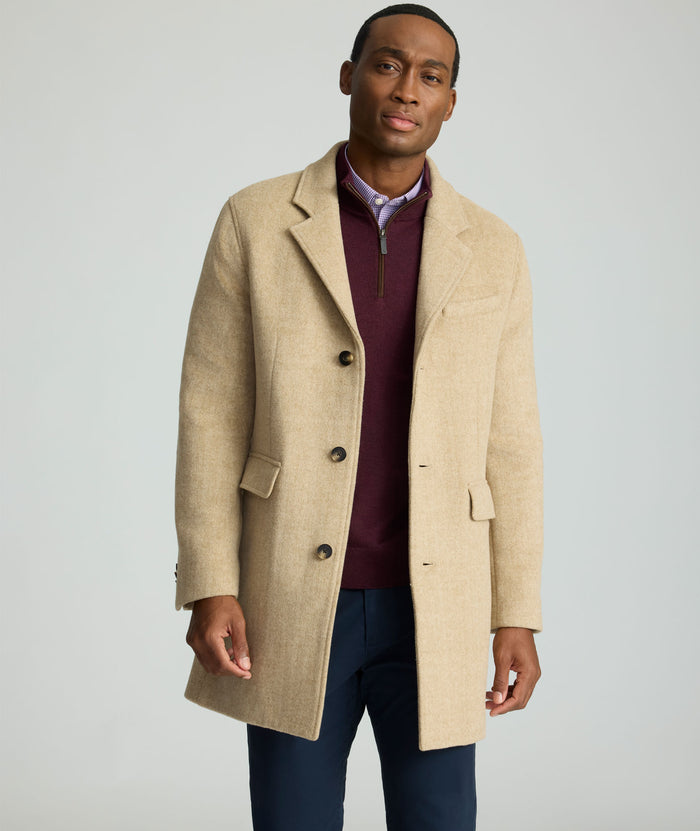 Model is wearing UNTUCKit Wool Top Coat.
