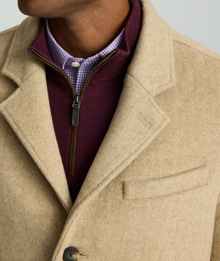 Model is wearing UNTUCKit Wool Top Coat.