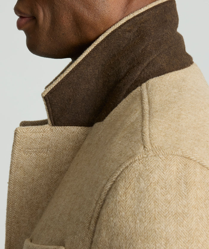 Model is wearing UNTUCKit Wool Top Coat.